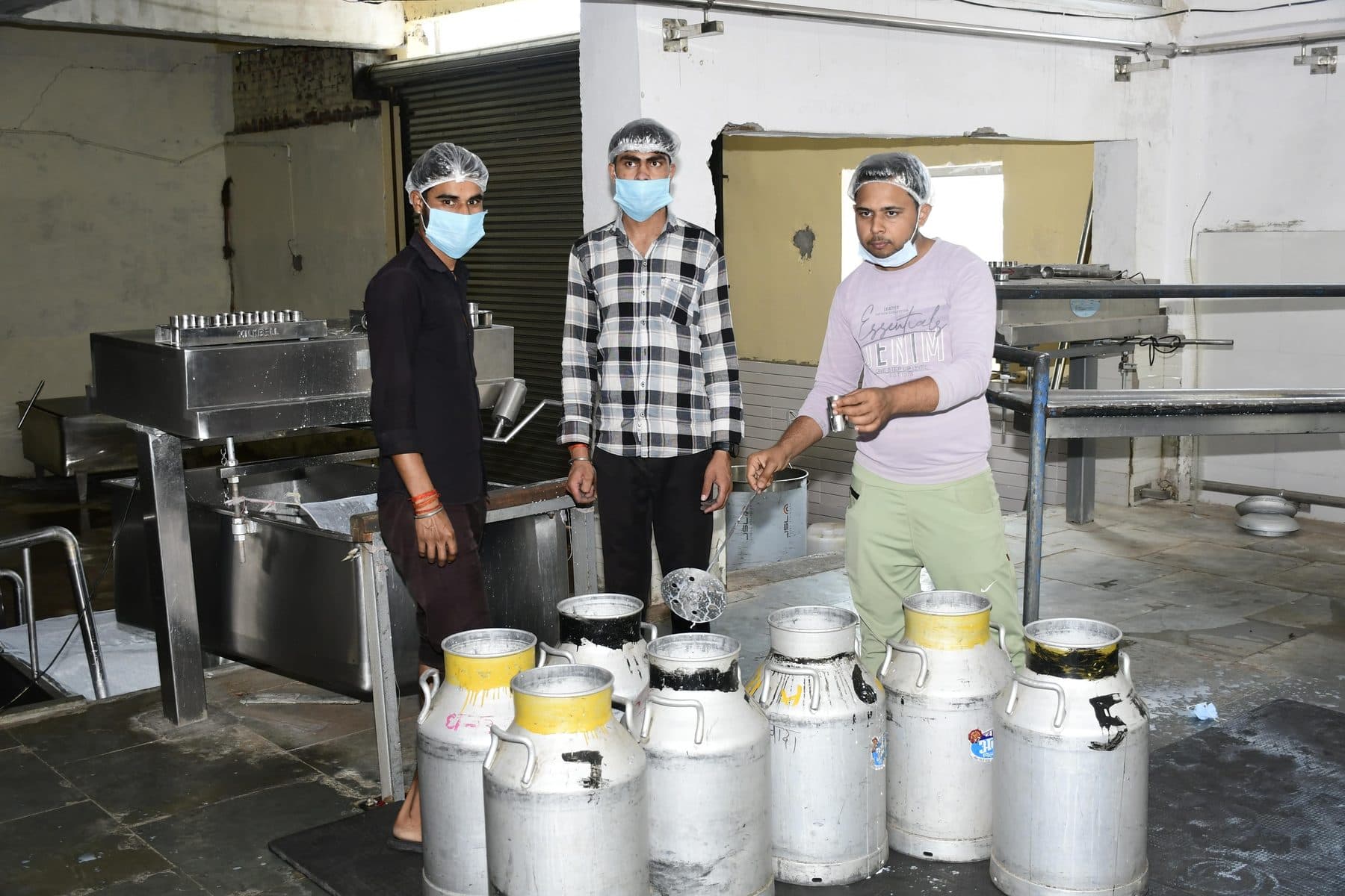 Cans staged for weighing and sampling
